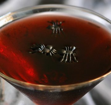Looking for a spooky Halloween cocktail recipe that's easy to make and tastes delicious? This is it! This Black Widow Cocktail is made from just 4 simple ingredients and is perfect for sipping on a chilly fall night or for serving to a crowd for a Halloween party.