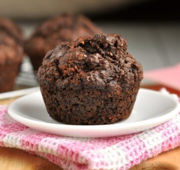 A healthy double chocolate bran muffin with melty chocolate chips