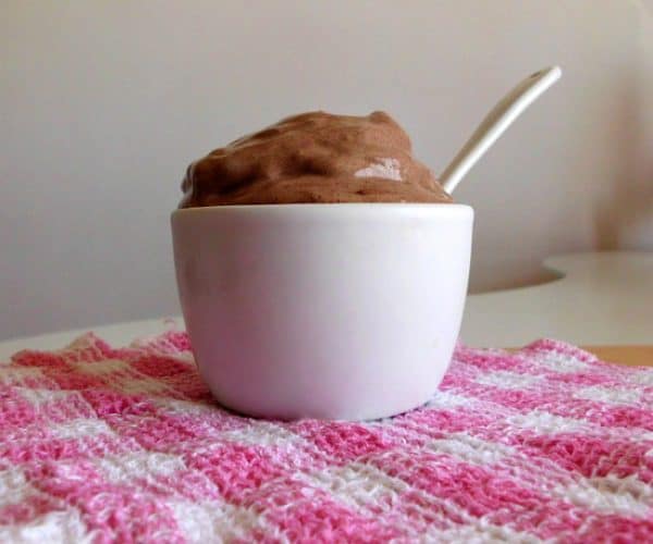 Healthy Four-Ingredient Soft-Serve #Chocolate Peanut Butter Ice Cream #Recipe - a #healthy ice cream recipe made from mashed bananas. It's #glutenfree and if you make it with non-dairy milk, it's even #vegan! Ready is seconds and tastes like the most amazing soft serve ice cream ever! | www.happyhealthymotivated.com