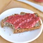 A small piece of toast covered in Strawberry chia seed jam