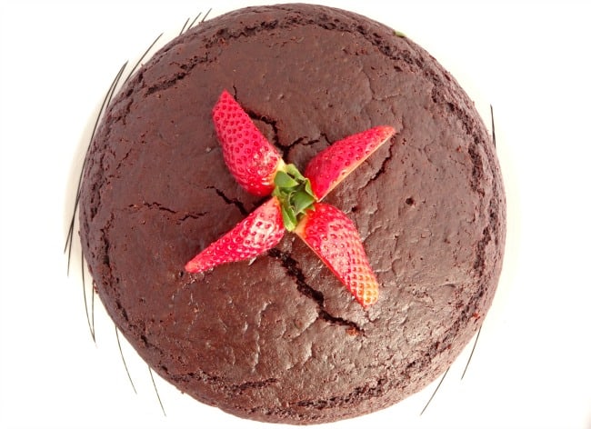 The Best Ever Healthy Fat-Free Vegan Chocolate Cake with Strawberries - this really is the ultimate dense and fudgy chocolate cake made with no milk, butter or eggs! | www.happyhealthymotivated.com
