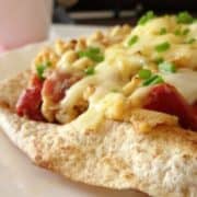 Easy Breakfast Tostada #Recipe - a quick and easy #breakfast recipe that tastes delicious! Loaded with cheese, bacon and scrambled eggs, plus some hidden veggies for added nutrition. Perfect for busy weekdays or chilled out weekends! | www.happyhealthymotivated.com