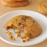 Close-up image of a partially eaten Healthy Pumpkin Cookie with Chocolate Chips