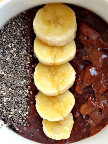 Healthy Double Chocolate Chia Banana Oatmeal Recipe - this is my favourite breakfast recipe of all time! It's so rich and chocolatey that it tastes more like dessert than breakfast! Plus it's less than 400 calories and only takes 10 minutes to make. Perfect for busy weekday mornings!