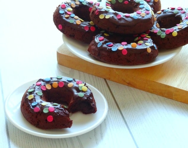 Healthy Triple Chocolate Donuts Recipe - these healthy donuts are baked instead of fried, so they've only got 160 calories each! They're so rich, chocolatey and fudge-like you would NEVER believe they're healthy!