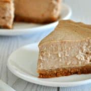 Healthy Pumpkin Spice Cheesecake Recipe | Love the fall flavor of pumpkin spice but hate actual pumpkin? This cheesecake is for you! It's got the most amazing smooth and creamy texture for just 250 calories a slice and contains absolutely no pumpkin. Gimme a fork!