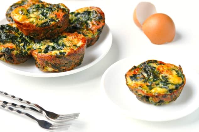 Healthy Breakfast Egg Muffins with Bacon + Spinach Recipe | Get ready because these light and fluffy muffins of deliciousness will soon become your favorite healthy breakfast! They're quick and easy to make - perfect for busy weekday mornings.