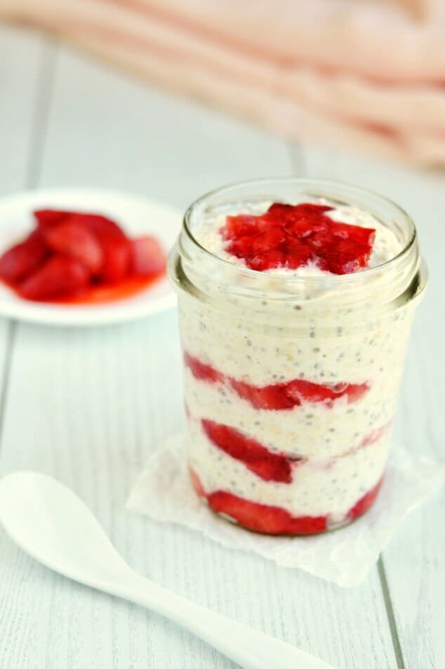 Strawberry Cheesecake Overnight Oats layered in a small jar