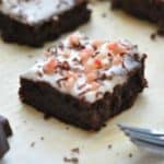 One healthy peppermint brownie surrounded by leftover crumbs