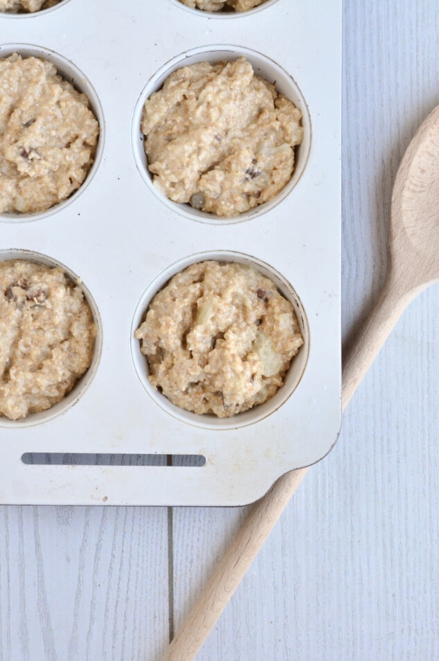 Batter for Healthy Oat Bran Muffins with Chocolate Chips in a muffin tin