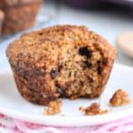 A Healthy Oat Bran Muffin with Chocolate Chips with a bite taken out